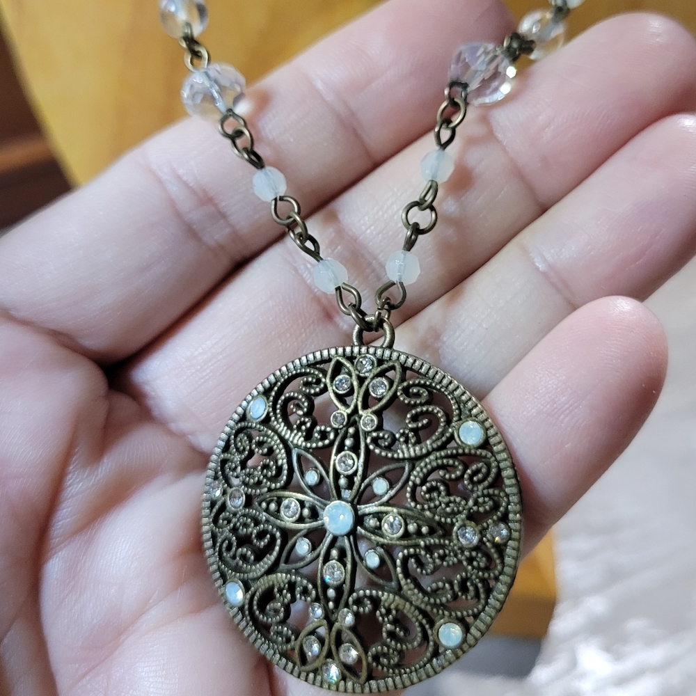 Antique Bronze Filagree Pendant on 36" Long Chain with White & Clear Beads